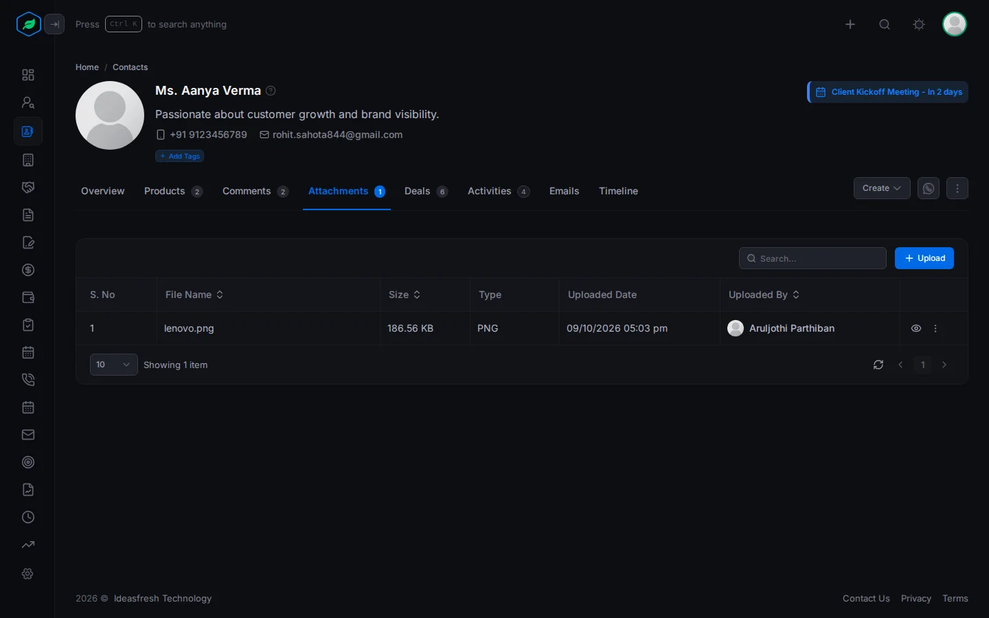 The Attachments tab on a contact, with an uploaded file and the Upload button
