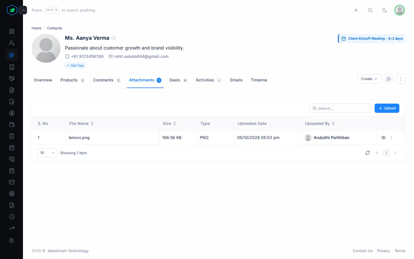 The Attachments tab on a contact, with an uploaded file and the Upload button